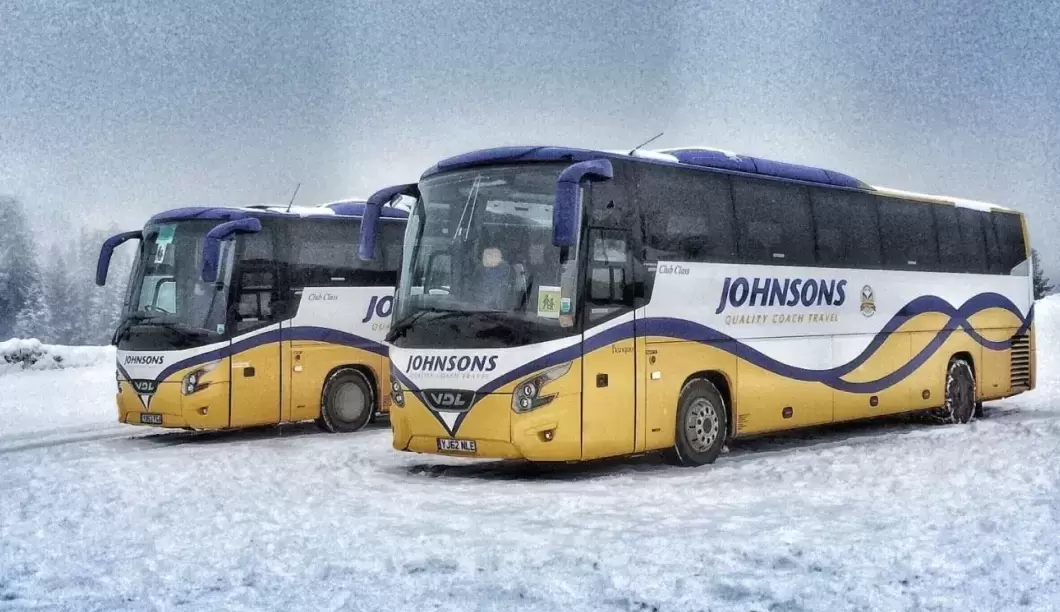 Coaches in the snow