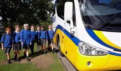 School kids by coach