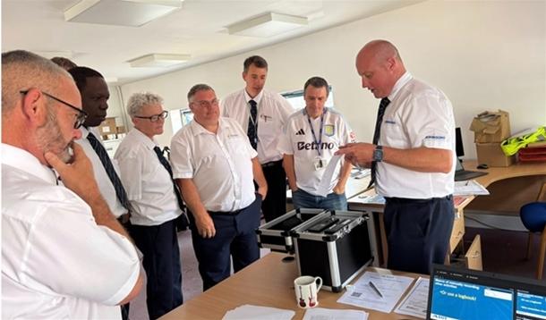 Staff surveying documents